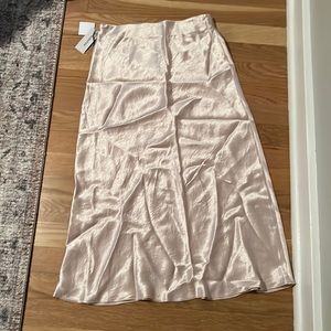 Aritzia pink silk slip midi skirt